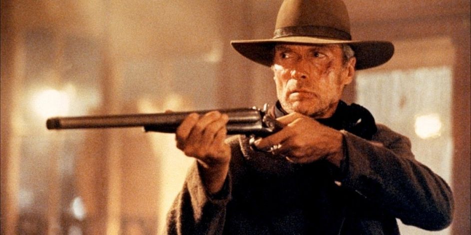 Clint-Eastwood-in-Unforgiven-walking-through-a-house-with-a-long-barrelled-gun